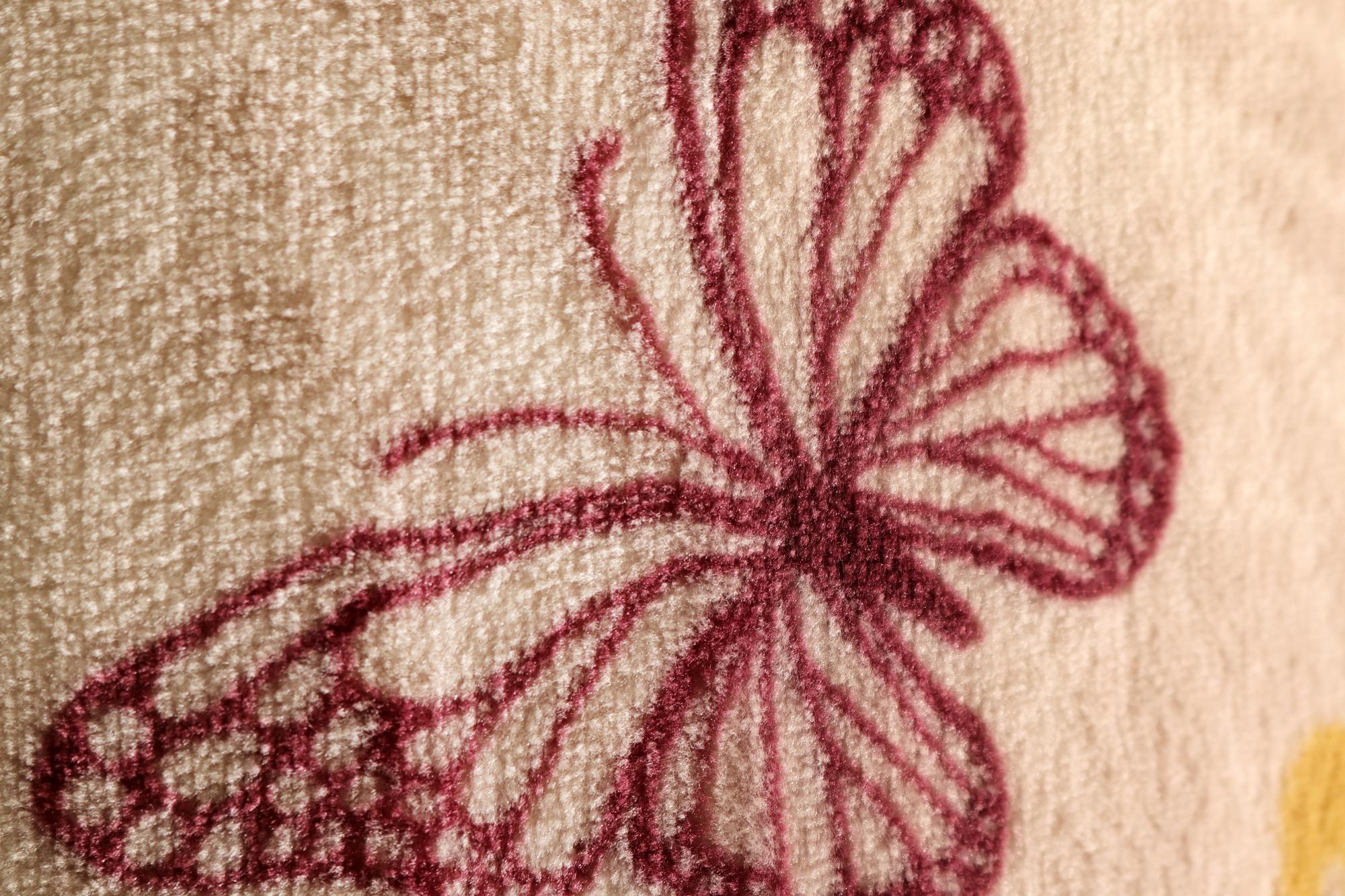 close-up of geometric embroidery on linen